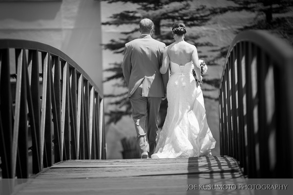 picture of bride and groom on bridge
