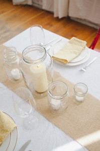 Old jars as candle holders for wedding reception