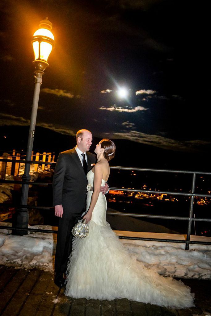 picture of a bride and groom under a starry winter sky