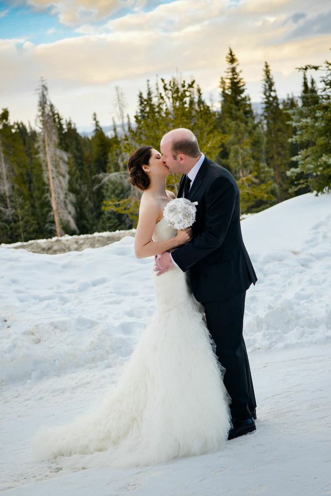picture of a bride and groom in the snow
