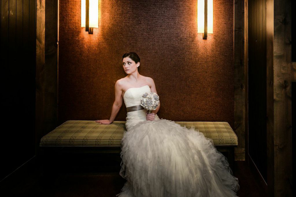 picture of a bride under dramatic lighting